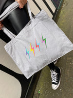 'Thunderstruck' Heather Grey Tote Bag (Large) by stray funk design